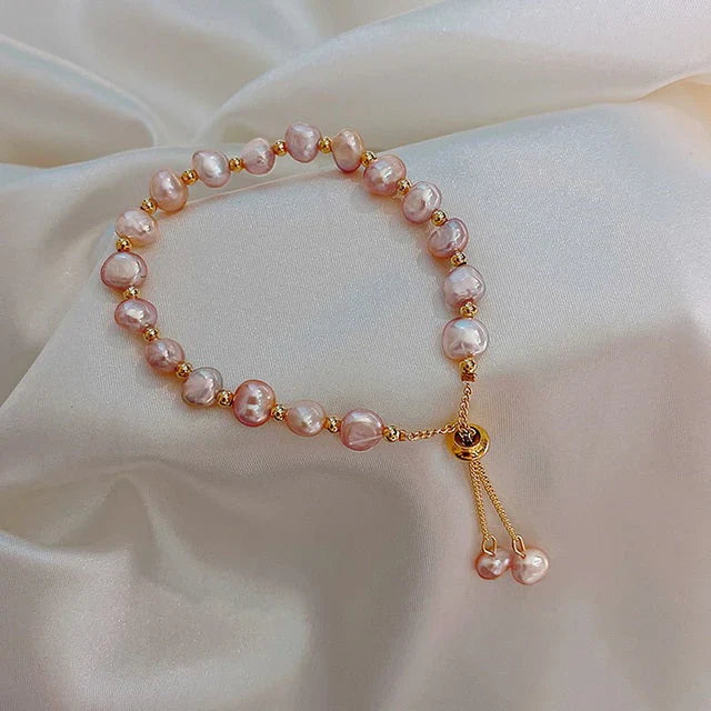 Bracciale vintage con perline rosa