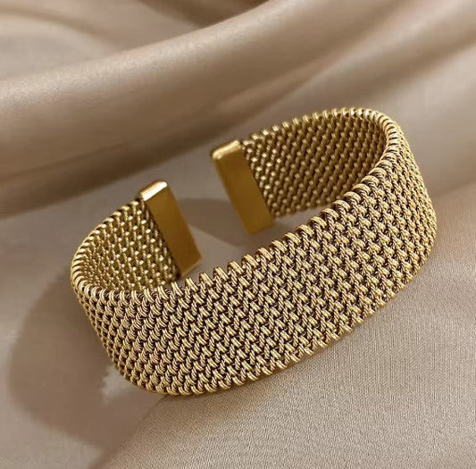 Bracciale classico aperto a maglia intrecciata